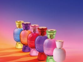 site-industries-cosmetiques Une rangée de flacons de parfum colorés avec une apparence de gemme.