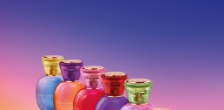 site-industries-cosmetiques A row of colorful perfume bottles with a gem-like appearance.