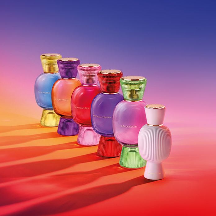 site-industries-cosmetiques A row of colorful perfume bottles with a gem-like appearance.