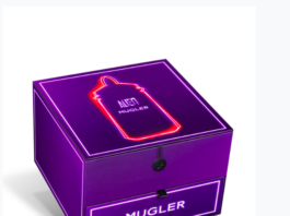 site-industries-cosmetiques 由 Pure Trade 制作的印有 "Mugler "字样的限量版紫色盒子，带有霓虹灯效果。所用关键词：紫色盒子、Mugler、Pure Trade、霓虹灯效果