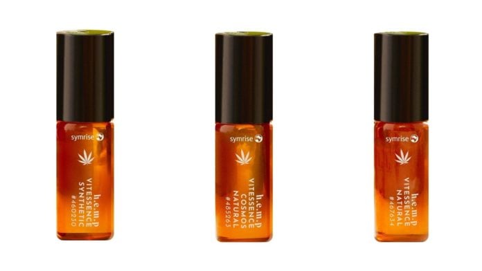 site-industries-cosmetiques Un trío de bálsamos labiales de color naranja que destacan los beneficios naturales del cáñamo Vitessence sobre un fondo blanco.