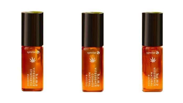 site-industries-cosmetiques A trio of orange lip balms highlighting the natural benefits of Vitessence hemp on a white background.