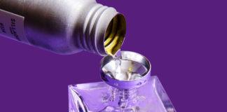 site-industries-cosmetiques A perfume bottle spills onto a purple background adorned with the Stoelzle Masnières sign.