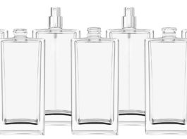 site-industries-cosmetiques Six clear glass bottles.