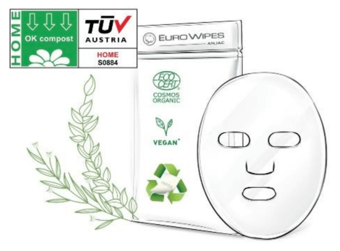 site-industries-cosmetiques A biodegradable fabric mask with a green leaf.