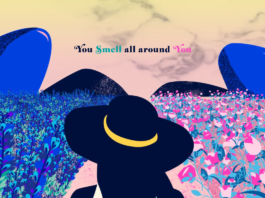 site-industries-cosmetiques A woman in a hat strolls through a field of flowers, immersing herself in a variety of fragrant scents.