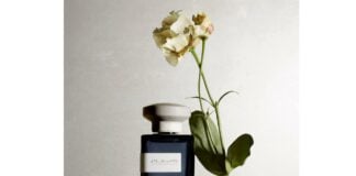 site-industries-cosmetiques A perfume bottle with a floral fragrance.