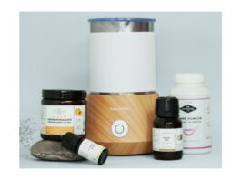 site-industries-cosmetiques 一瓶精油和一个扩香器。