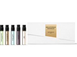 site-industries-cosmetiques Conjunto de cinco frascos de perfume numa caixa branca.
