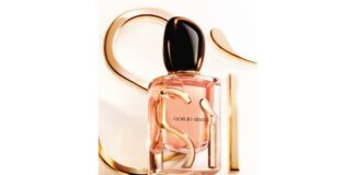site-industries-cosmetiques Une bouteille de parfum sur fond blanc.