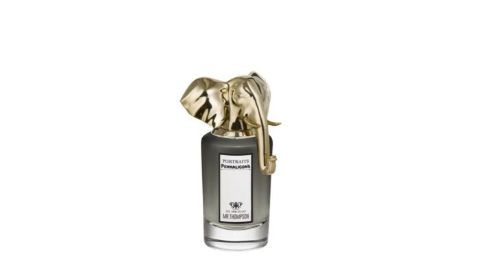 site-industries-cosmetiques Une bouteille en or avec un éléphant dessus - une bouteille en or, un éléphant.