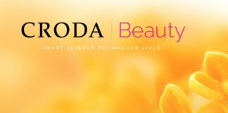 site-industries-cosmetiques Un vibrante anuncio de Croda Beauty con un primer plano de flores naranjas con un efecto de fondo borroso y el texto "Croda Beauty, ciencia inteligente para mejorar la vida" incluye ahora Phytess