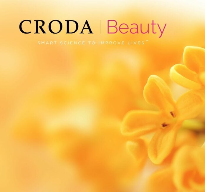 site-industries-cosmetiques Un vibrante anuncio de Croda Beauty con un primer plano de flores naranjas con un efecto de fondo borroso y el texto "Croda Beauty, ciencia inteligente para mejorar la vida" incluye ahora Phytess