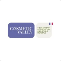 site-industries-cosmetiques La imagen muestra un logotipo con dos formas. La de la izquierda es un rectángulo morado con esquinas redondeadas que contiene el texto "COSMETIC VALLEY" en blanco. La forma de la derecha es un cuadrado gris claro con esquinas redondeadas que contiene el texto "BEATING HEART OF THE WORLD'S COSMETIC INDUSTRIES" en gris y dos pequeñas barras de color, una azul y otra roja, en blanco.