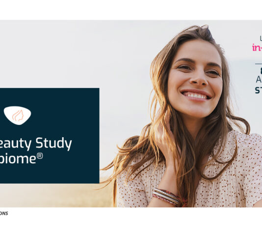 site-industries-cosmetiques Uma mulher sorridente com cabelo comprido está de pé num campo aberto. O texto diz: "Visite-nos na in-cosmetics global, de 8 a 10 de abril em Amesterdão, stand 11J41. Descubra o Estudo de Beleza Holística com Cerebiome® para a saúde da pele". O logótipo Lallemand pode ser visto no canto inferior.