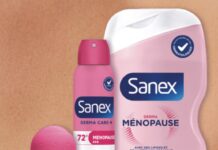 site-industries-cosmetiques Se presentan tres productos de la gama Sanex Derma Care+ Menopause: un desodorante en bola, un desodorante en spray y un frasco de gel de ducha, todos ellos con un envase rosa y blanco, que destaca sobre un fondo con un primer plano de piel.